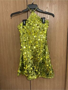 Green sequin halter neck dress